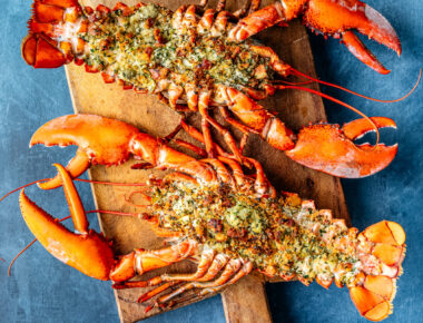 Whole Stuffed Maine Lobster with Herby Artichoke Pancetta Bread Crumbs